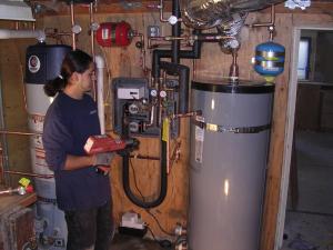 our water heater repair techs doing a full water heater inspection 